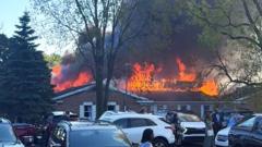 Death toll rises to four after Michigan church shooting and arson attack