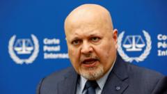 ICC suspends top prosecutor after investigating misconduct allegations